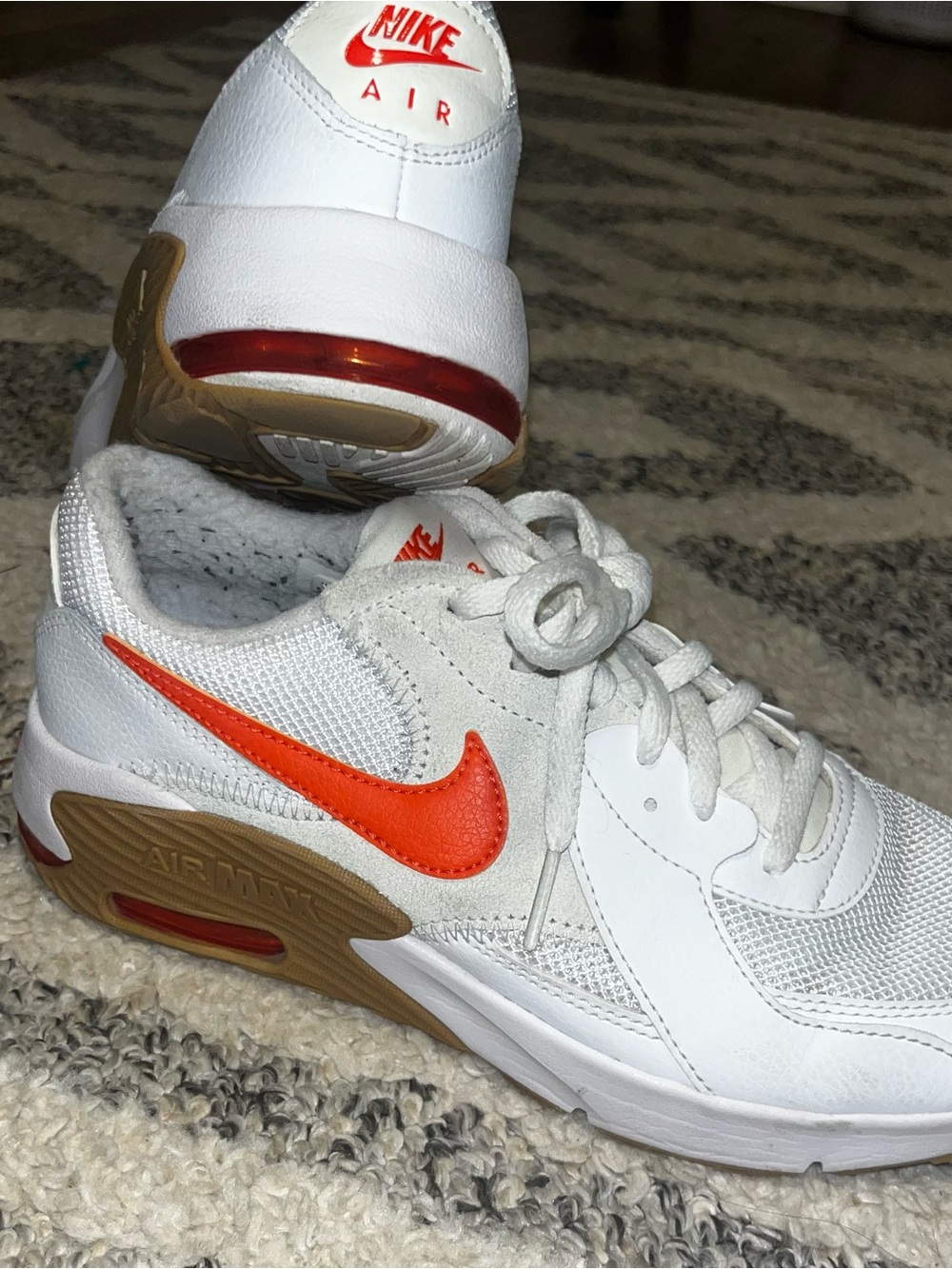 Nike White Sneakers with Orange Swoosh and Gum Accents